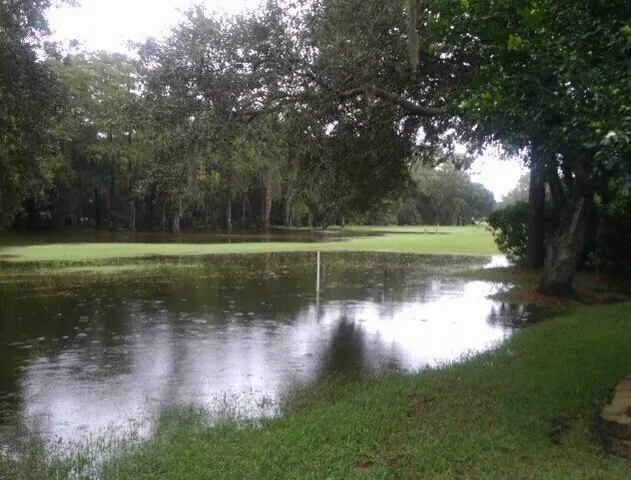 Resident photograph showing ponded water extending over grassy course land
